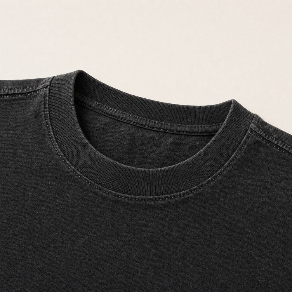The ribbed collar of The Day Won’t Solve Itself Tee