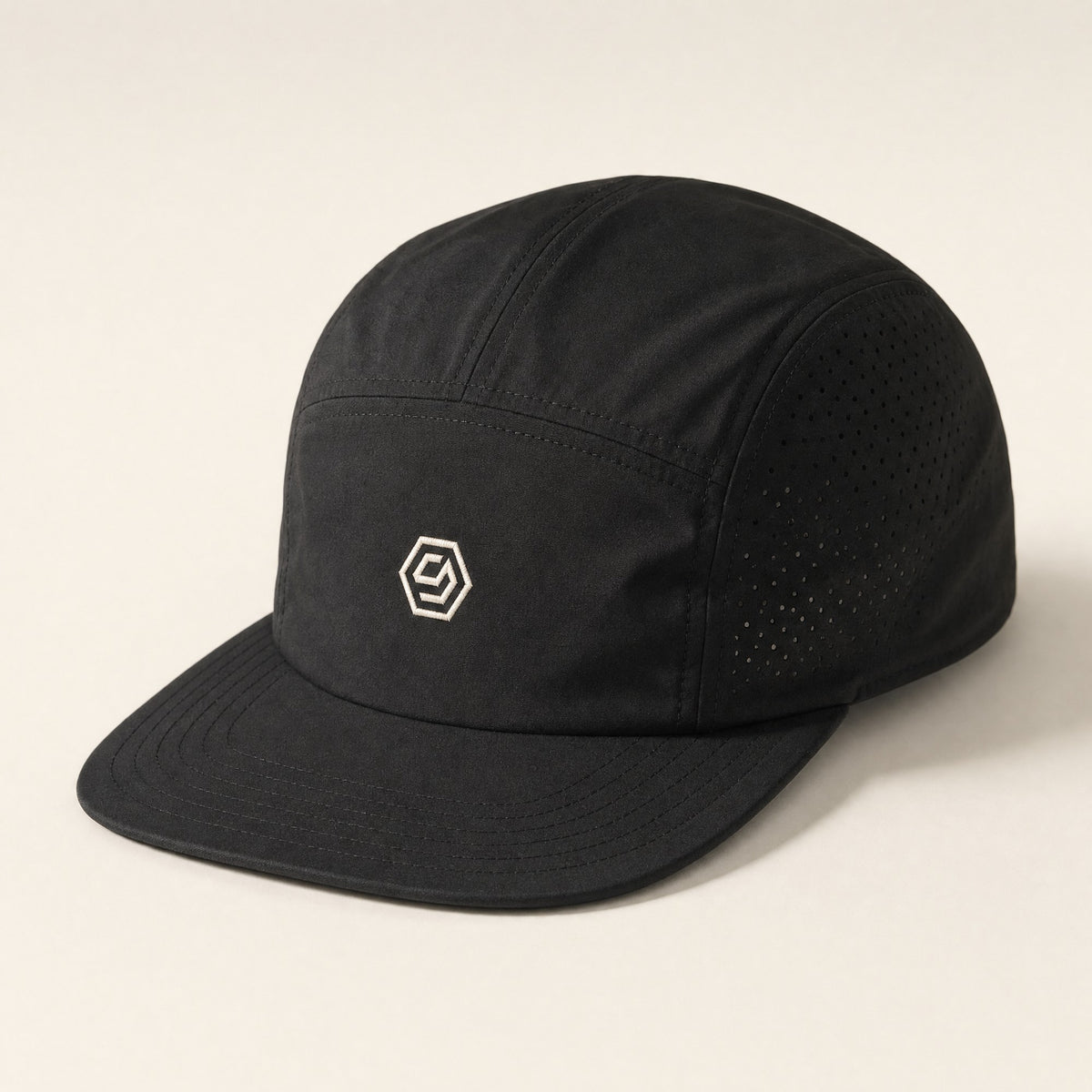 Solve Cap in black with a bone hex mark