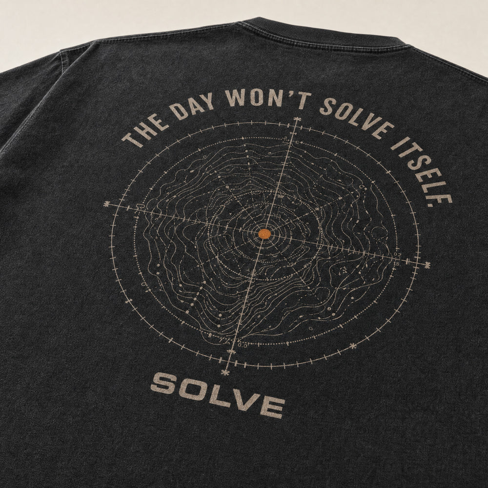 The back print of The Day Won’t Solve Itself Tee, close up