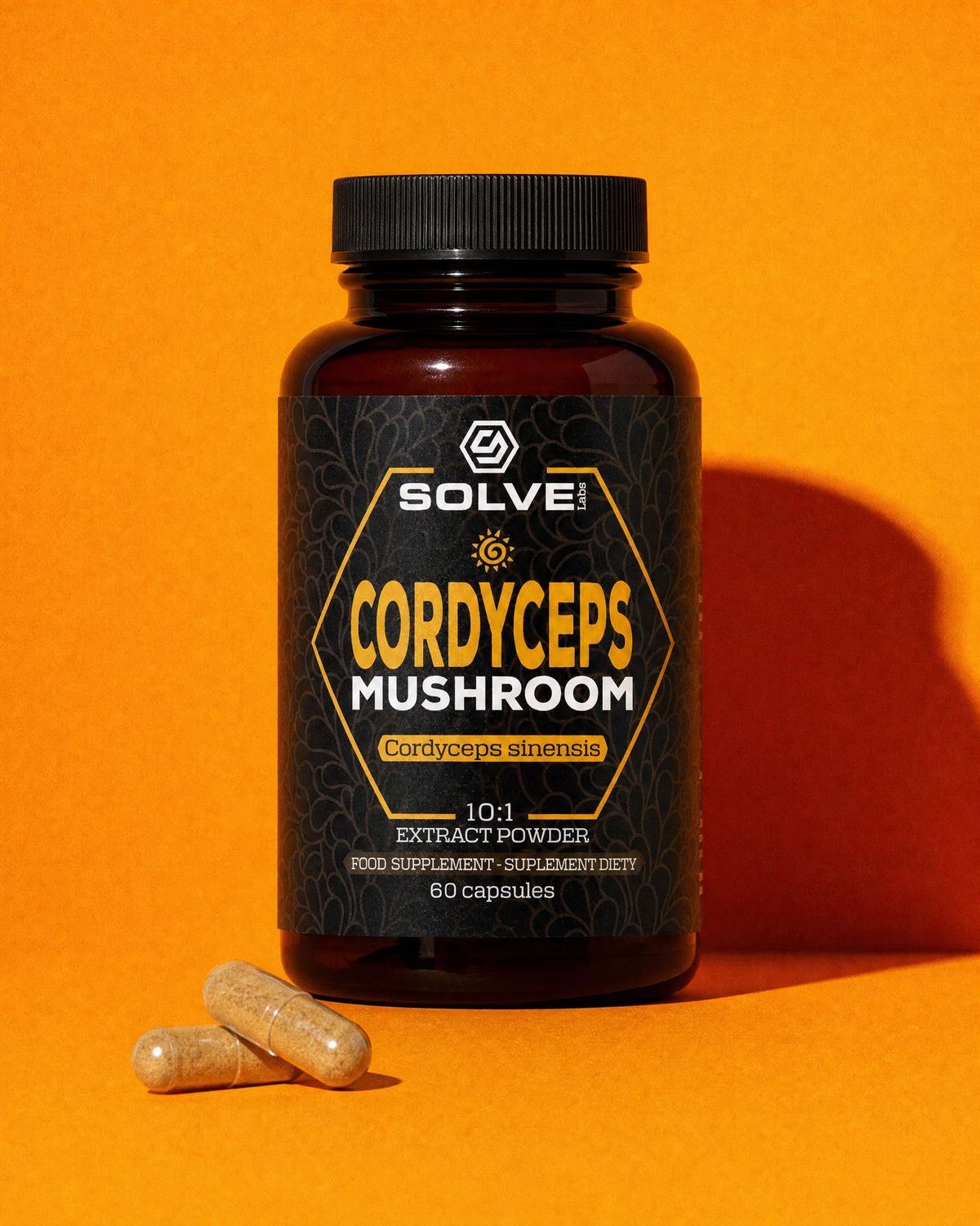 A jar of Solve Labs Cordyceps capsules on an orange backdrop with two capsules in front of it