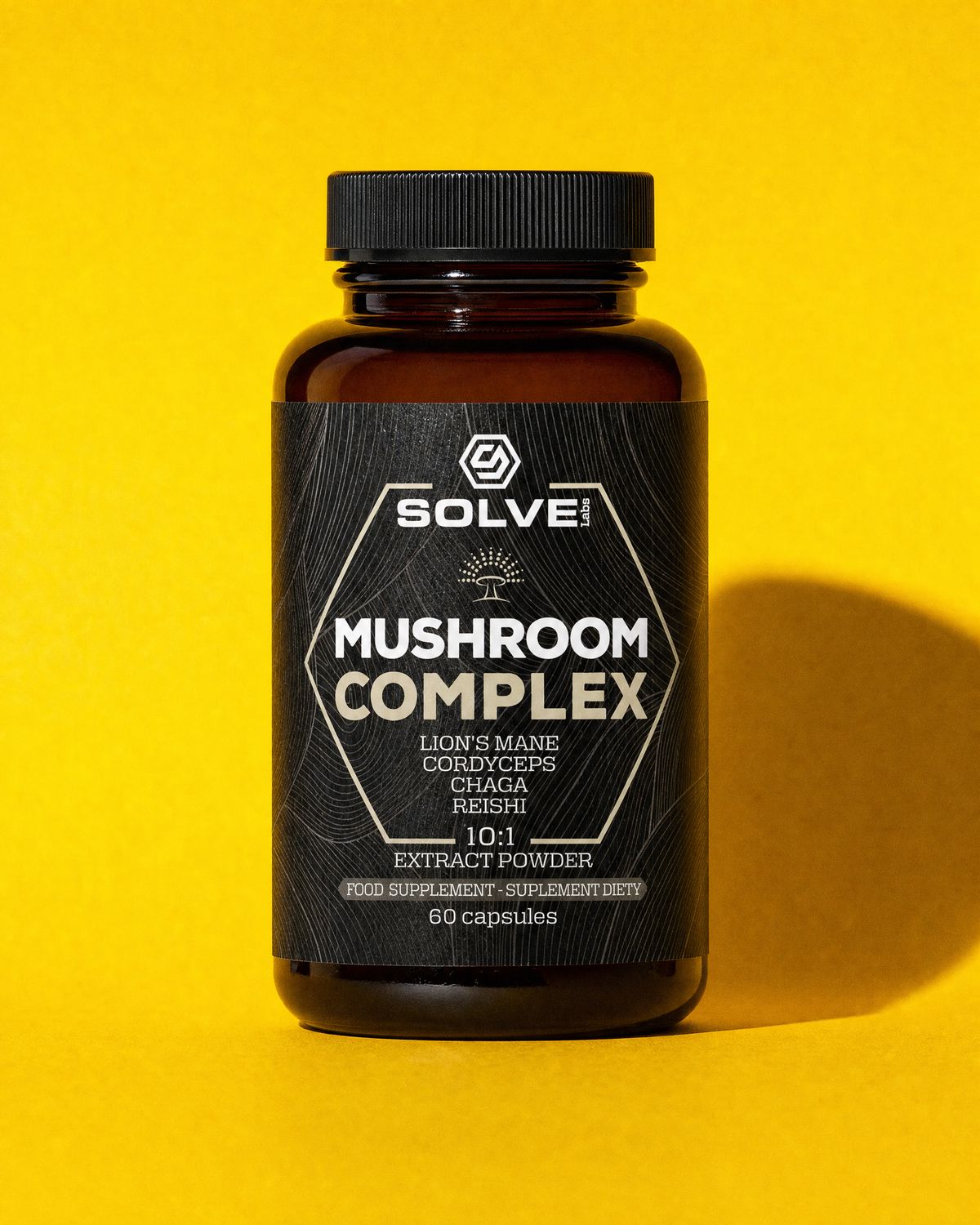 A jar of Solve Labs Mushroom Complex capsules on a mustard-yellow backdrop