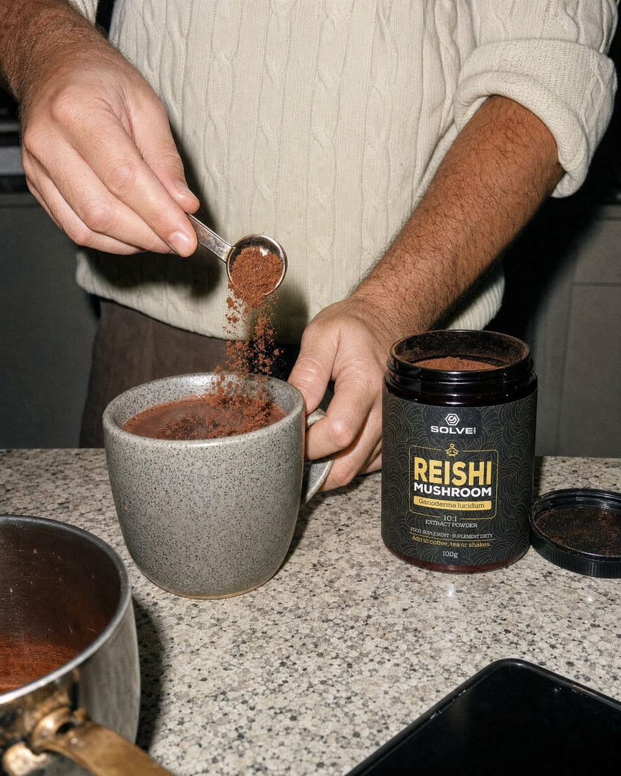 Reishi powder stirred into a warm evening drink