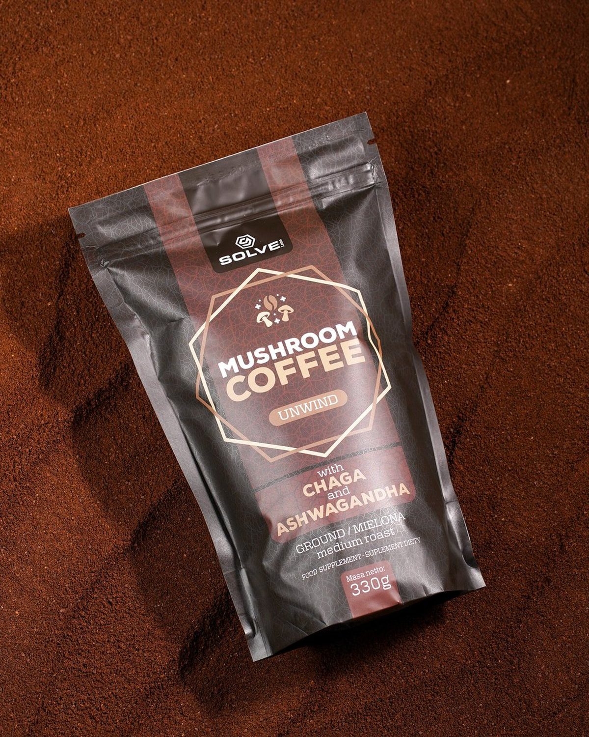 A bag of Mushroom Coffee with Chaga lying in ground coffee