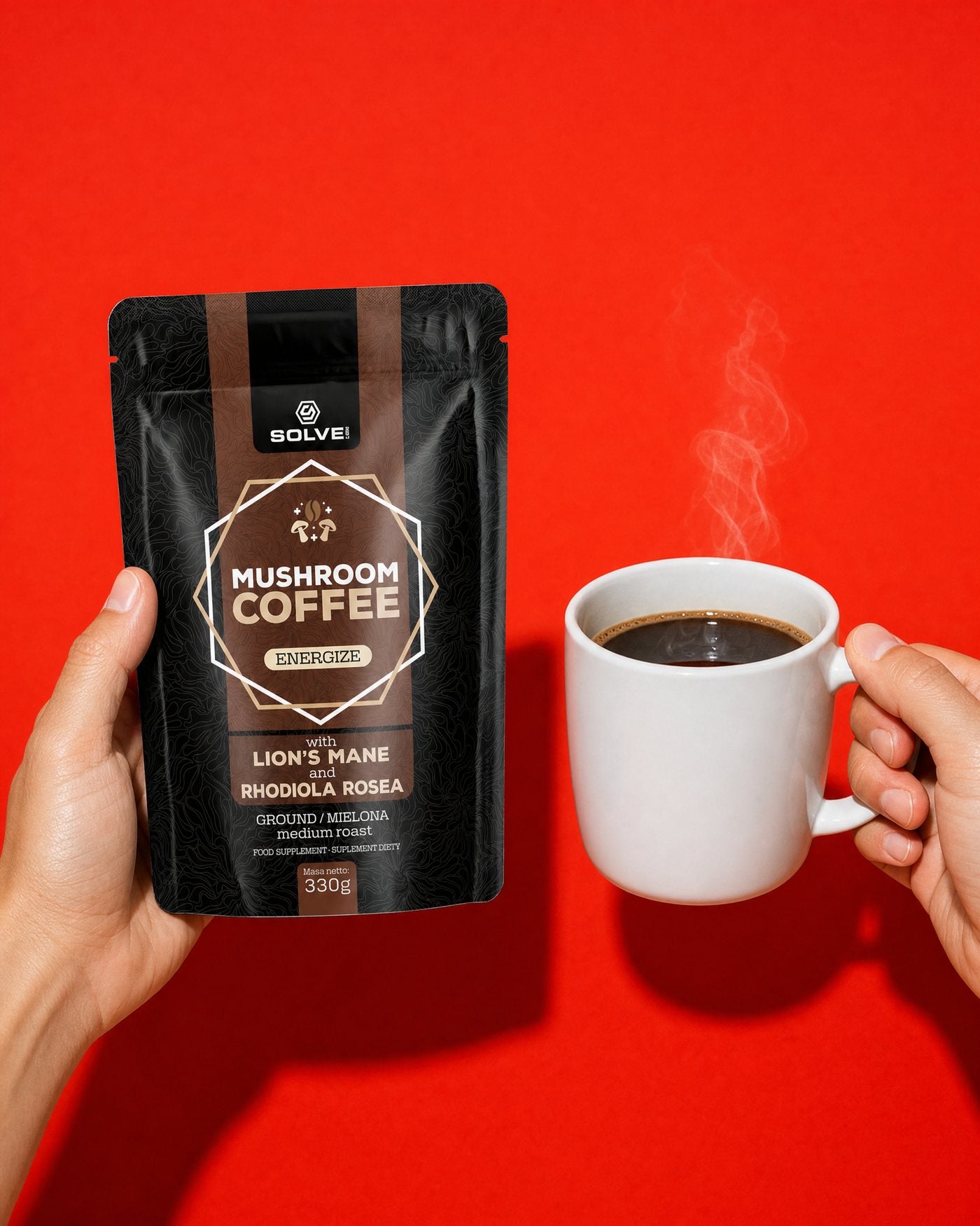 A hand holding the Solve Labs Mushroom Coffee bag beside a hand holding a white mug of black coffee, on a red ground