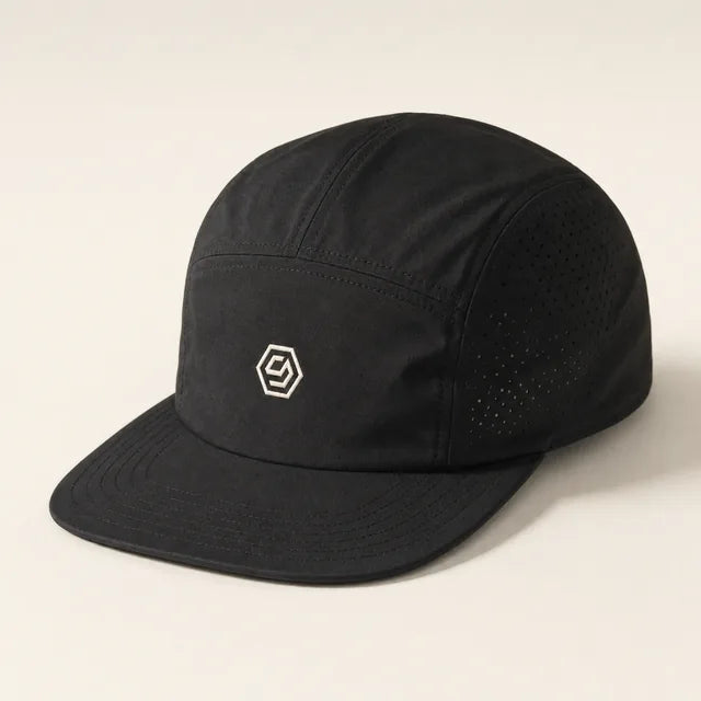 Solve Cap in black with a bone hex mark