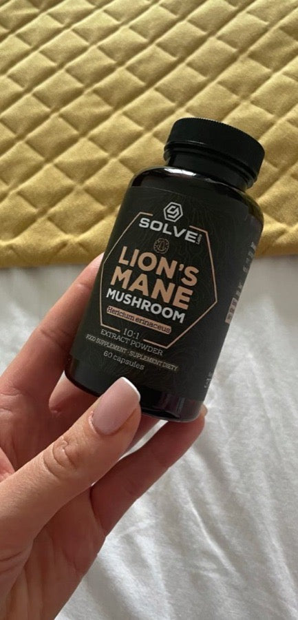 Buyer holding the Solve Labs Lion's Mane jar