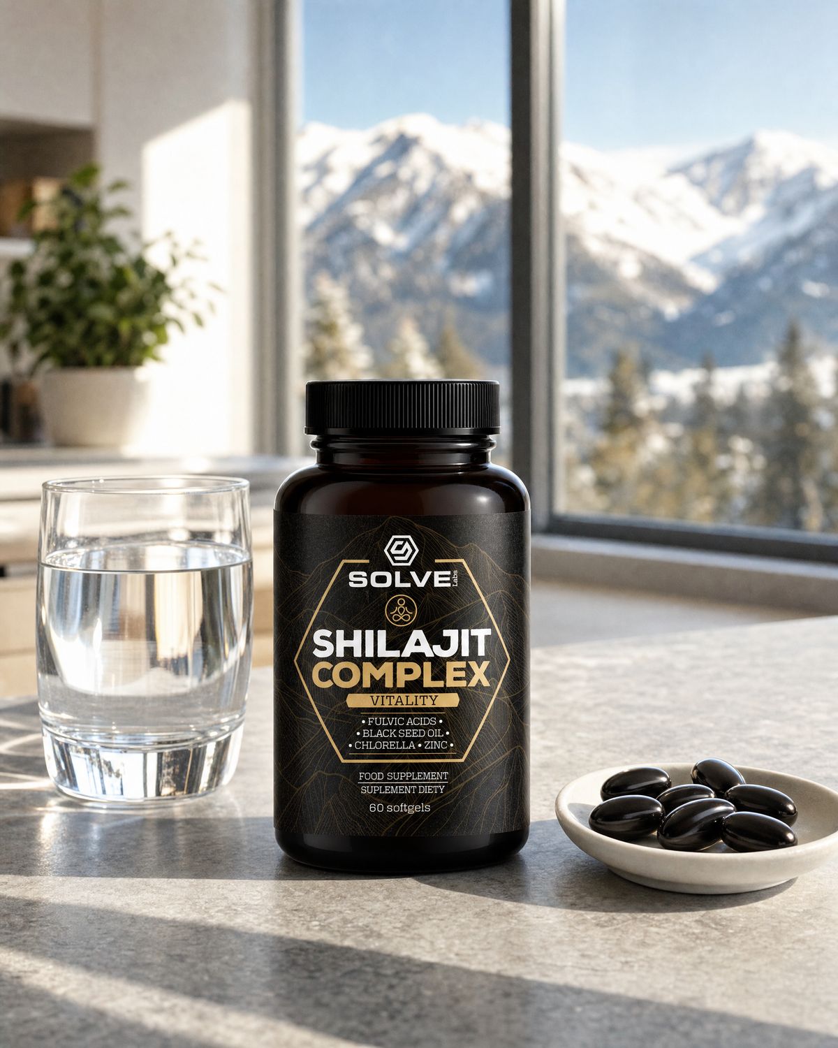 The jar of Solve Labs Shilajit Complex on a stone kitchen counter with a dish of dark softgels, mountains in the window behind
