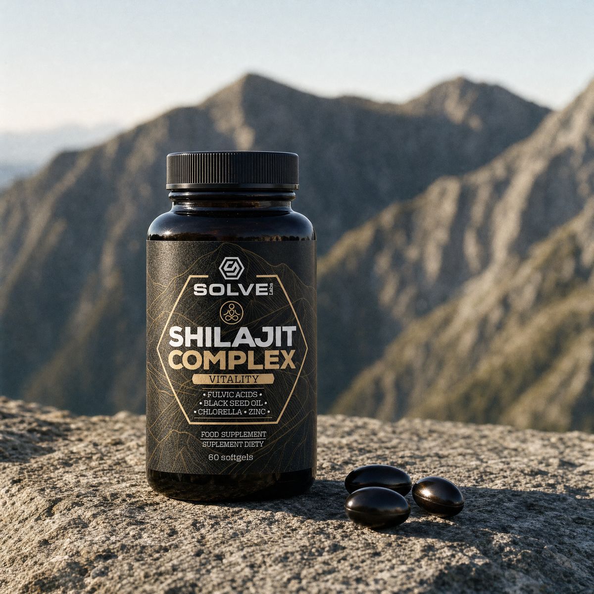 The jar of Solve Labs Shilajit Complex on a slab of mountain rock with three dark softgels beside it